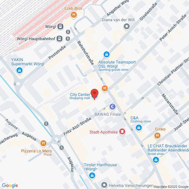 Lehrlingsportal.at Karte, die einen Teil von Wörgl, Österreich, zeigt, mit Markierungen für ein Einkaufszentrum, eine Apotheke und verschiedene Geschäfte, darunter ein Sportartikelgeschäft und ein Bekleidungsgeschäft in der Nähe der Bahnhofstraße.