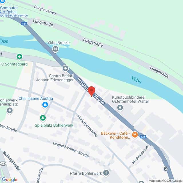 Lehrlingsportal.at Kartenansicht eines Stadtausschnitts mit Straßen, Fluss und Sehenswürdigkeiten wie Restaurants, Bäckerei und Spielplatz. Eine rote Markierung kennzeichnet einen bestimmten Ort in der Waldegger Straße.