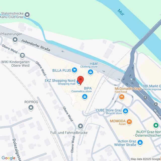 Lehrlingsportal.at Karte eines Einkaufsviertels in Graz, Österreich, mit eingezeichneten Geschäften wie Billa Plus, H&M und anderen in der Nähe der Mur und angrenzender Straßen.