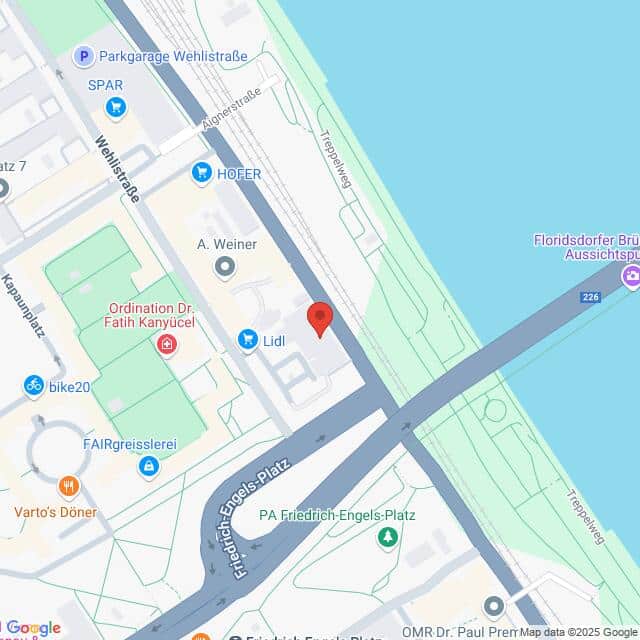 Lehrlingsportal.at Karte mit einem mit einer roten Stecknadel markierten Standort in der Nähe von Lidl und dem Friedrich-Engels-Platz in Wien, direkt an der Donau. In der Nähe befinden sich Geschäfte, ein Park und eine Fußgängerbrücke.