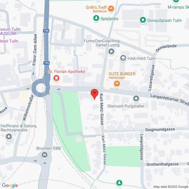 Lehrlingsportal.at Eine Karte, die das Gebiet um die Karl-Metz-Gasse in Tulln, Österreich, zeigt, mit eingezeichneten Straßen, Geschäften und Sehenswürdigkeiten in der Nähe.