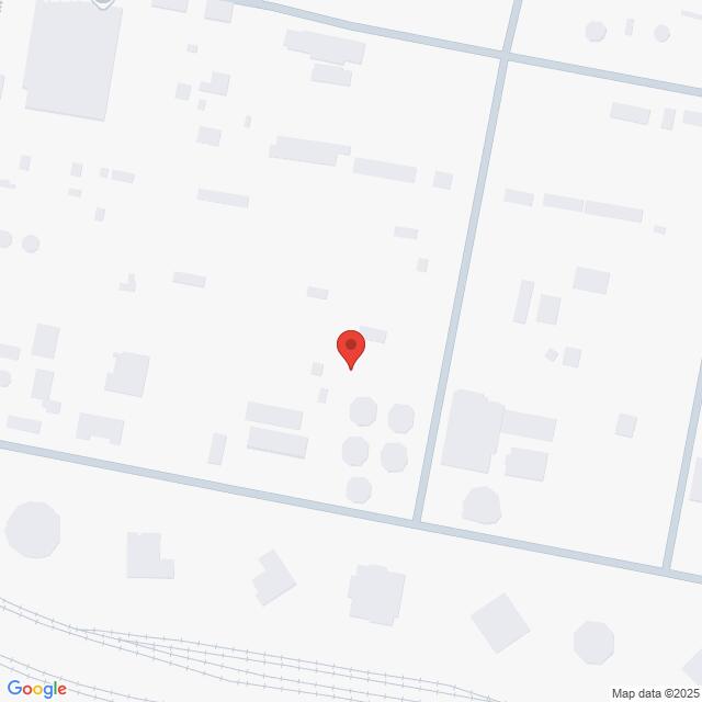 Lehrlingsportal.at Eine Karte mit einer roten Stecknadel, die einen Ort zwischen mehreren hellgrauen Gebäudeumrissen und Straßen auf weißem Hintergrund markiert.