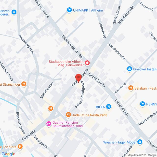 Lehrlingsportal.at Eine digitale Karte zeigt Straßen und Geschäfte in Altheim, Österreich, mit dem Mittelpunkt der Kreuzung Bahnhofstraße und Linzer Straße, wobei die nahegelegenen Geschäfte und Restaurants markiert sind.