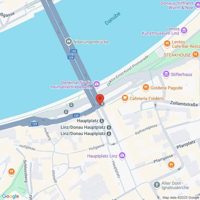 Lehrlingsportal.at Karte der Gegend um den Linzer Hauptplatz in Österreich, mit Straßen, Sehenswürdigkeiten und der Donau mit der Nibelungenbrücke.