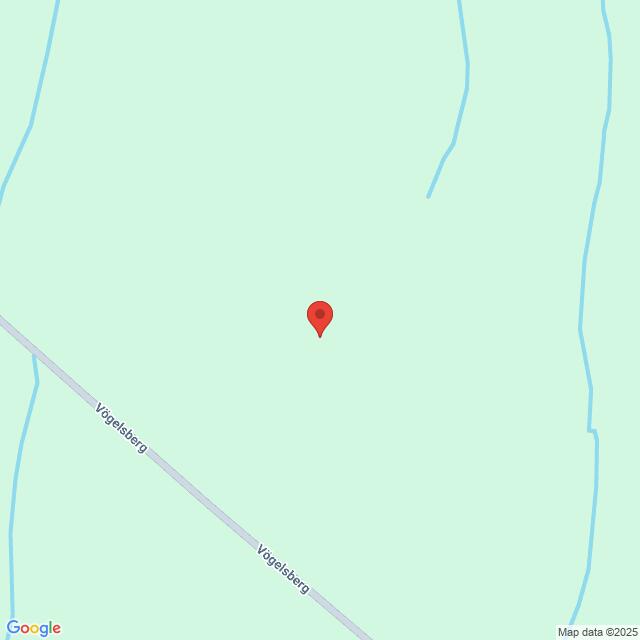 Lehrlingsportal.at Karte mit einer roten Stecknadel in der Nähe einer Straße mit der Aufschrift "Vogelsberg", umgeben von grünen Flächen und hellblauen Linien, die Bäche oder Grenzen anzeigen.