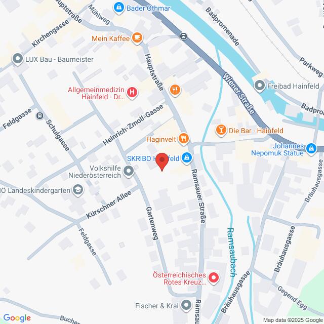 Lehrlingsportal.at Eine Karte mit Straßen und Sehenswürdigkeiten in Hainfeld, Österreich, zentriert auf der Hauptstraße mit nahegelegenen Geschäften, öffentlichen Gebäuden und dem Fluss.