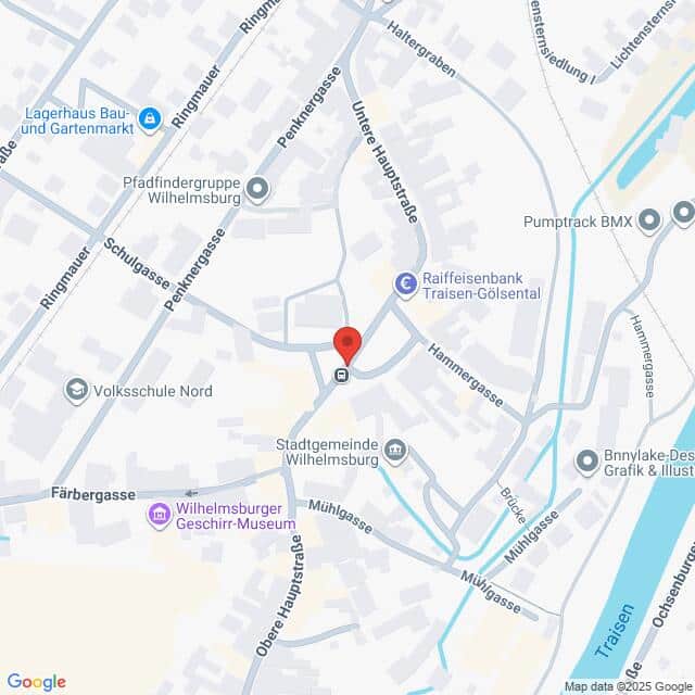 Lehrlingsportal.at Eine Karte, die den zentralen Bereich von Wilhelmsburg, Österreich, zeigt, mit einer roten Standortmarkierung in der Nähe der Stadtgemeinde Wilhelmsburg und einer Beschriftung der nahe gelegenen Straßen und Wahrzeichen.