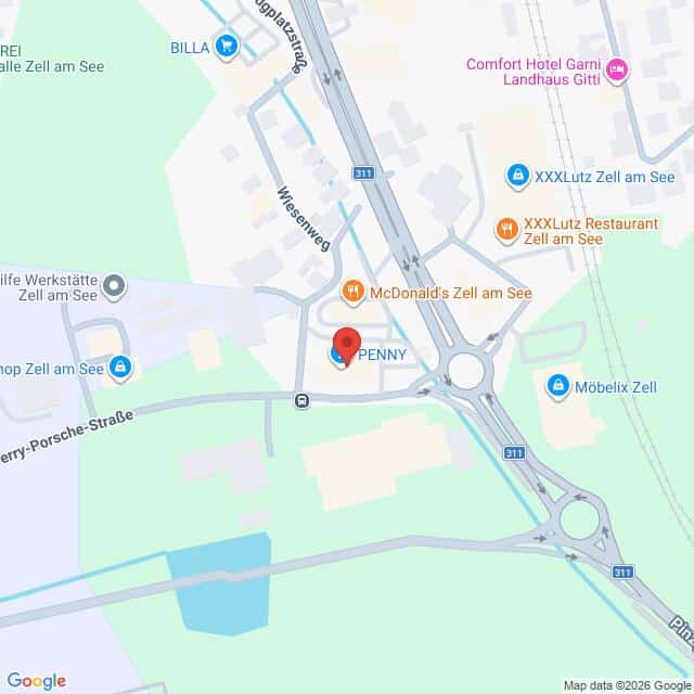 Lehrlingsportal.at Karte mit der Lage des PENNY-Supermarkts in Zell am See, Österreich, in der Nähe eines Kreisverkehrs mit nahe gelegenen Geschäften wie McDonald's, XXXLutz und Möbelix.