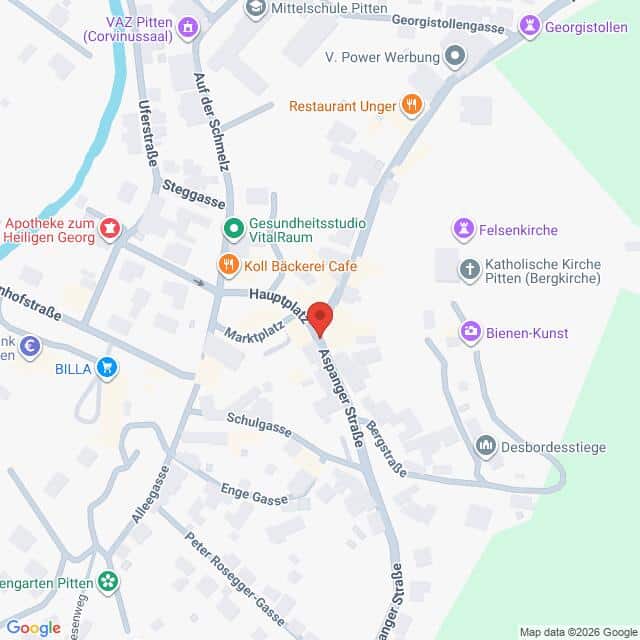 Lehrlingsportal.at Eine Karte, die einen zentralen Bereich mit beschrifteten Straßen, Sehenswürdigkeiten und Geschäften zeigt, zentriert auf den Hauptplatz und die Asanger Straße in Pitten, Österreich.