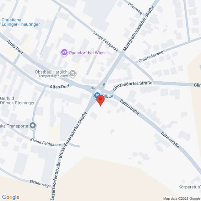 Lehrlingsportal.at Karte eines Teils von Raasdorf, Österreich, mit Straßen wie der Bahnstraße und der Langen Feldgasse sowie einigen beschrifteten Geschäften und Wahrzeichen.