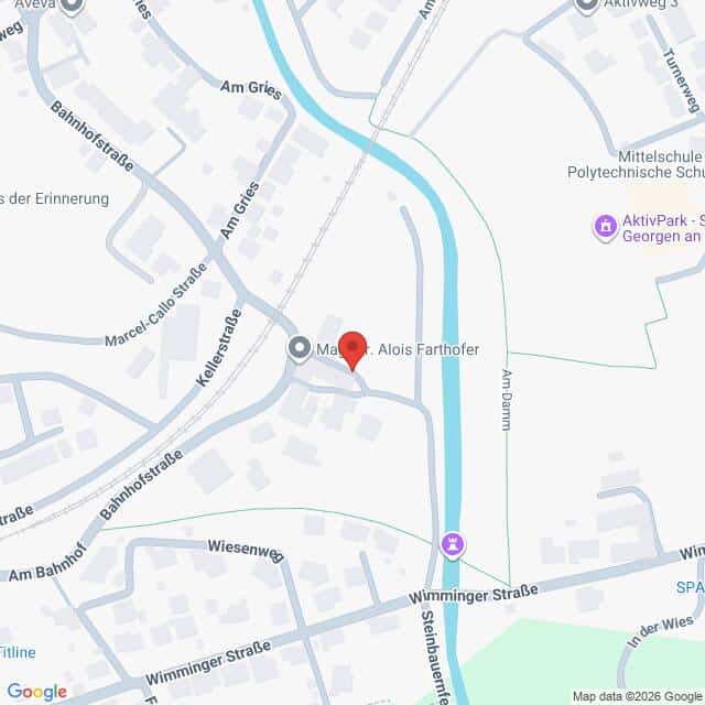 Lehrlingsportal.at Die Karte zeigt einen markierten Standort in der Kellerstraße in der Nähe der Bahnhofstraße und der Wiminger Straße, direkt an einem Fluss in einer Kleinstadt. Nahegelegene Straßen und Sehenswürdigkeiten sind beschriftet.