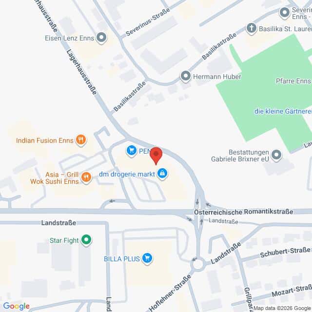 Lehrlingsportal.at Eine digitale Karte zeigt einen mit einer roten Stecknadel markierten Ort in der Nähe der Basilikastraße und der Landstraße in Enns, Österreich, auf der nahegelegene Geschäfte und Sehenswürdigkeiten verzeichnet sind.