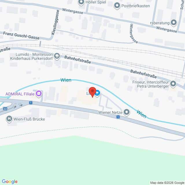 Lehrlingsportal.at Karte, die einen Ausschnitt aus Wien, Österreich, zeigt, mit beschrifteten Straßen, einem Kanal sowie Markierungen für Geschäfte und Einrichtungen in der Nähe der Bahnhofstraße und der Wien-Fluss-Brücke.