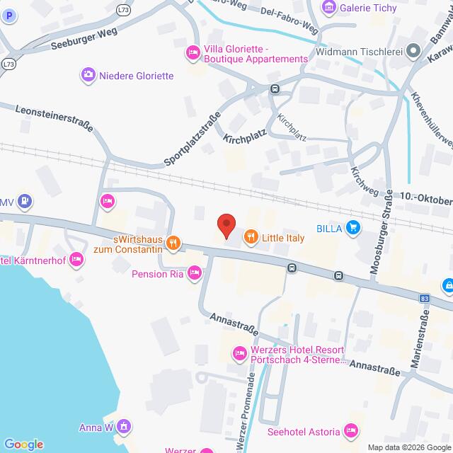 Lehrlingsportal.at Eine digitale Karte, auf der ein roter Marker einen Ort in der Nähe des Zentrums von Pörtschach kennzeichnet, mit den Namen der umliegenden Straßen und Symbolen für lokale Geschäfte.