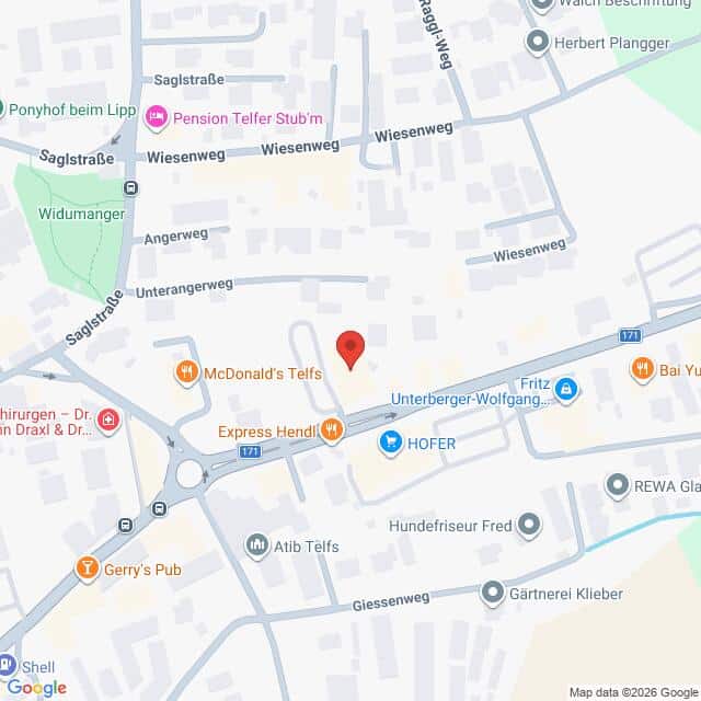Lehrlingsportal.at Eine digitale Karte, auf der ein roter Standort-Pin in Telfs, Österreich, in der Nähe von lokalen Geschäften und Straßen wie der Saglstraße und der Unterberger-Wolfgang-Straße zu sehen ist.
